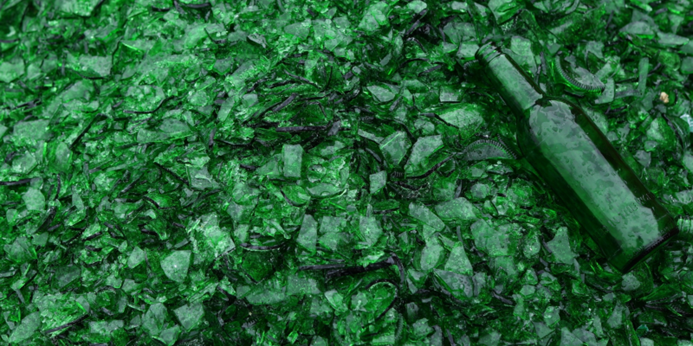 Recycled glass cullets from our recycling partners being prepared for reintegration into our bottling supply chain with our bottle manufacturers, reflecting our ongoing commitment to sustainable waste management.